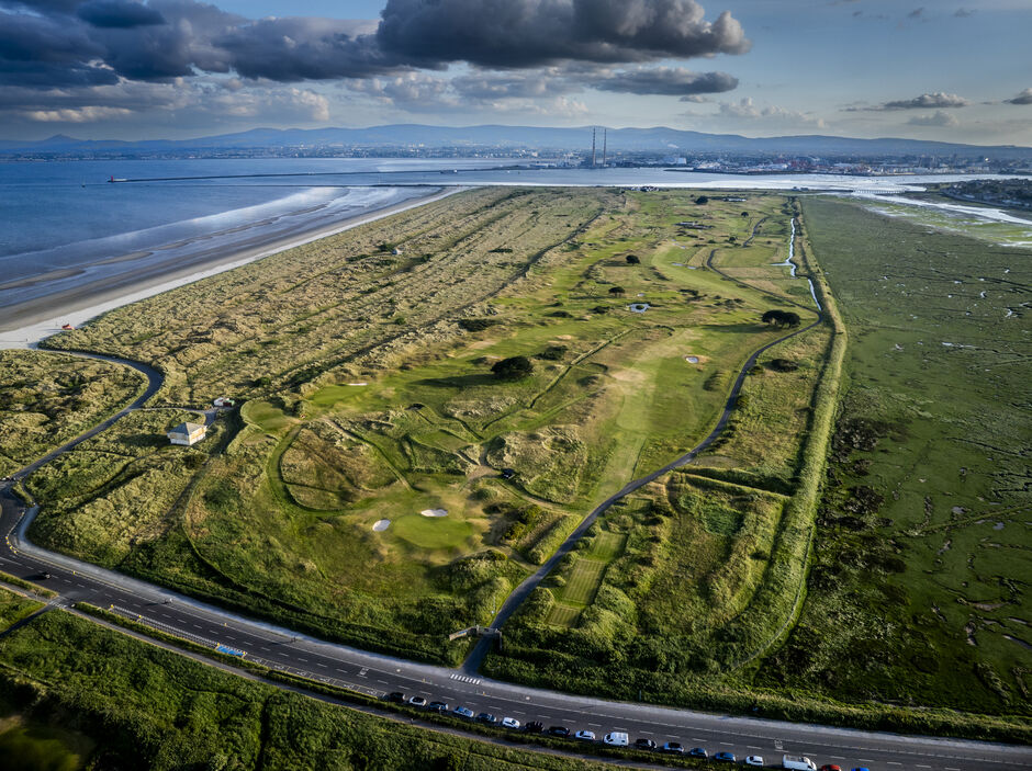 Aerial photograph of Golf Club of Dublin's links course on Bull Island, Dublin Bay, surrounded by natural dune habitat in 2024